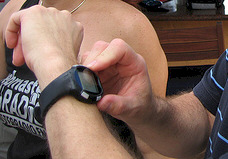 Who is this showing off their super techno watch